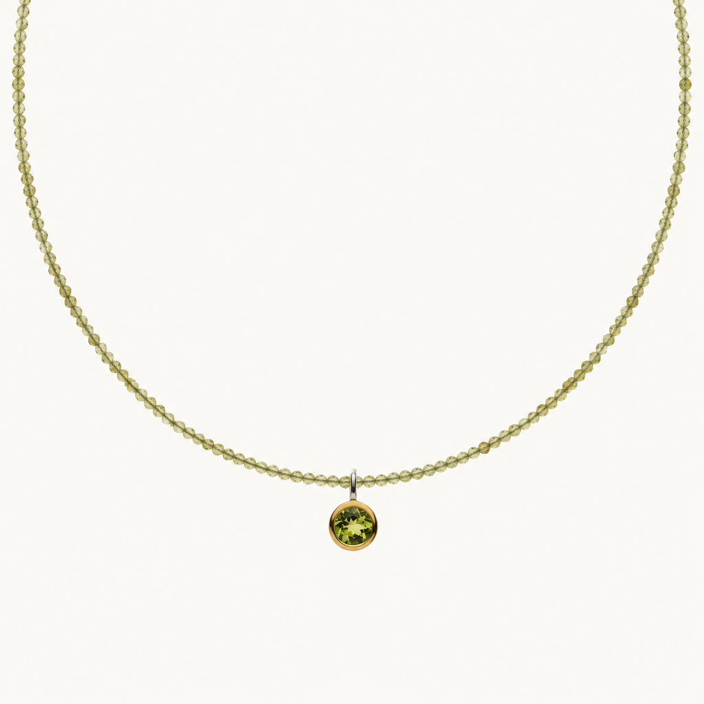 Facettierte Peridot-Kette mit Silberanhänger und vergoldeter Fassung